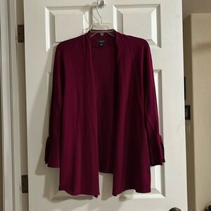 Winter flyaway cardigan.  Long sleeve with a bell hem with a bow. Very dressy.